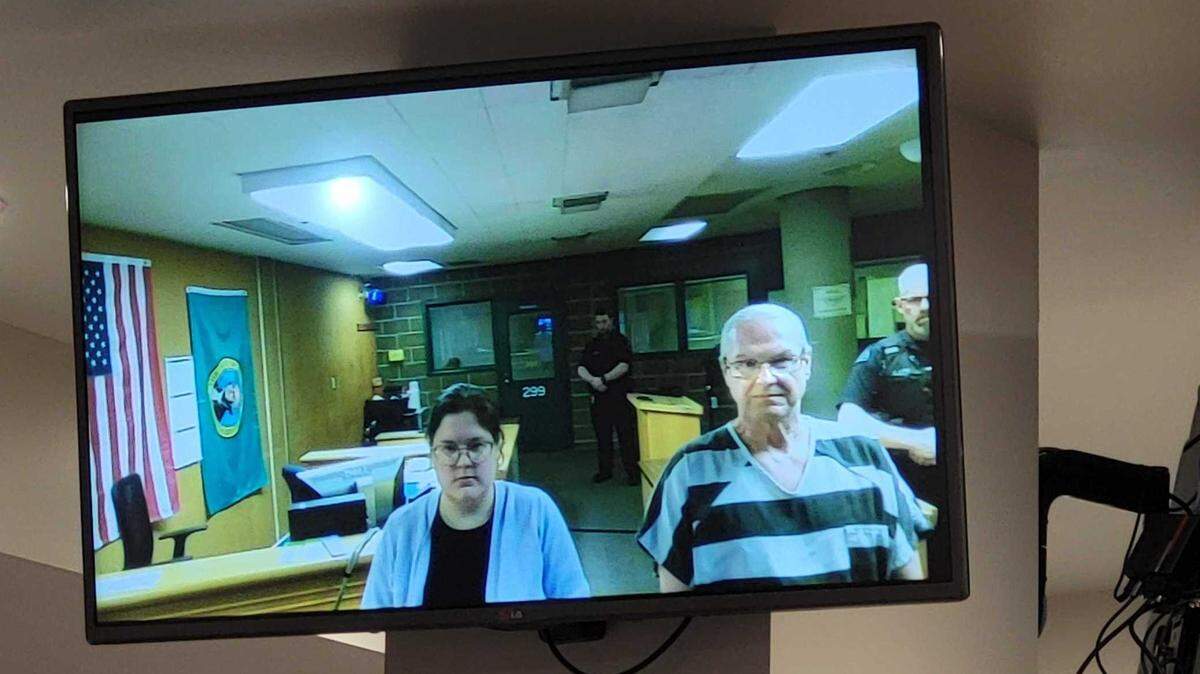 Darren Dee O’Neall, 63, right, appears from Whatcom County Jail on a monitor Thursday, March 2, in Whatcom County Superior Court. He was charged with one count of second-degree murder for the 1987 death of Wendy L. Aughe of Bellingham. He pleaded not guilty Friday, March 10, in Whatcom County Superior Court.