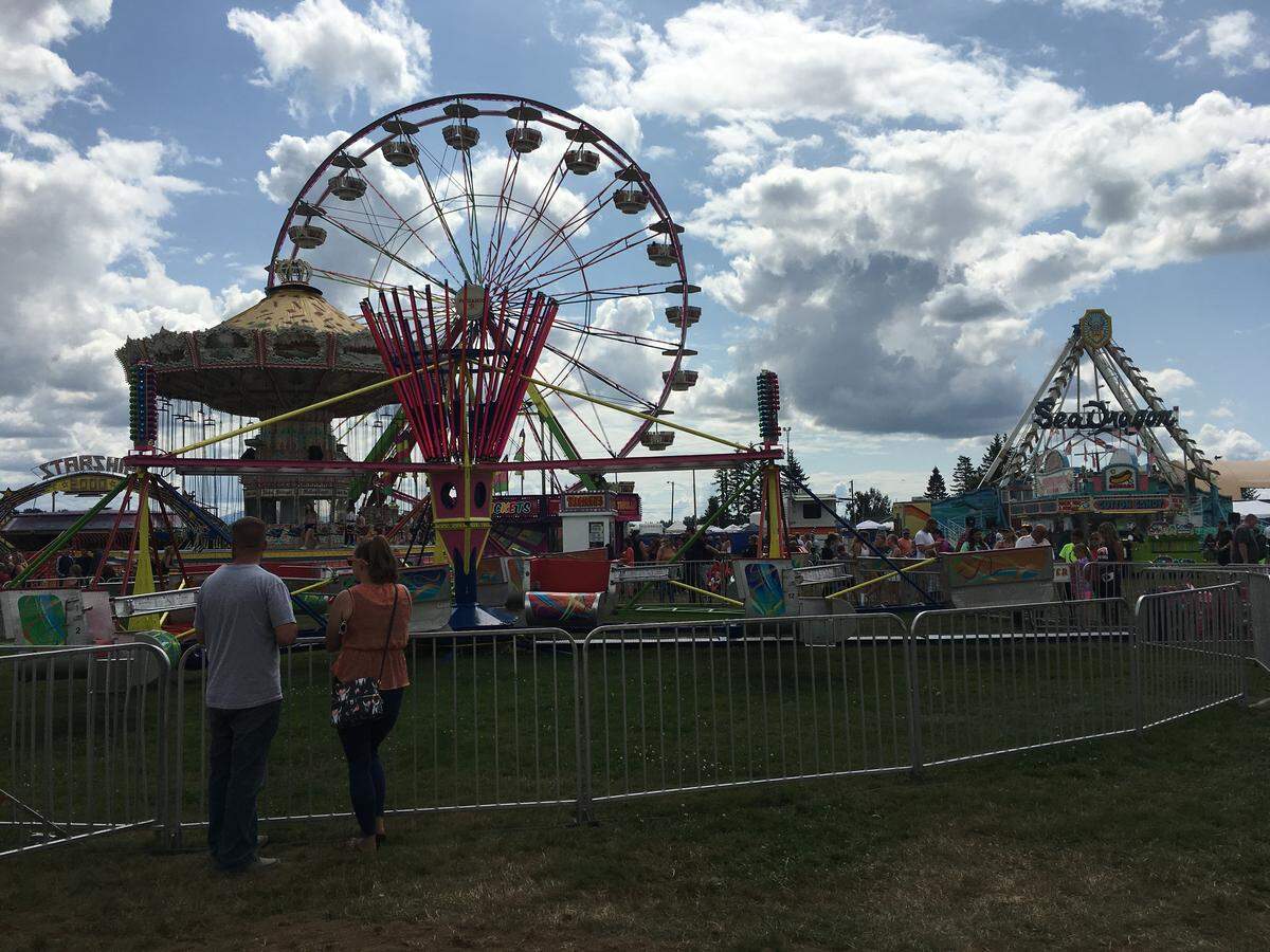 People enjoy the rides at the Northwest Washington Fair in Lynden.