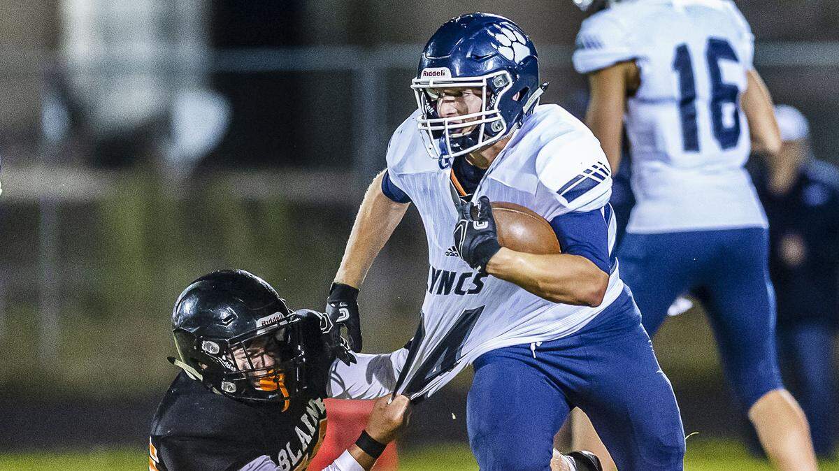 Blaine defender Gavino Rodriquz tries to pull down Lynden Christian running back Levi Korthuis Sept. 14 at Blaine High School.