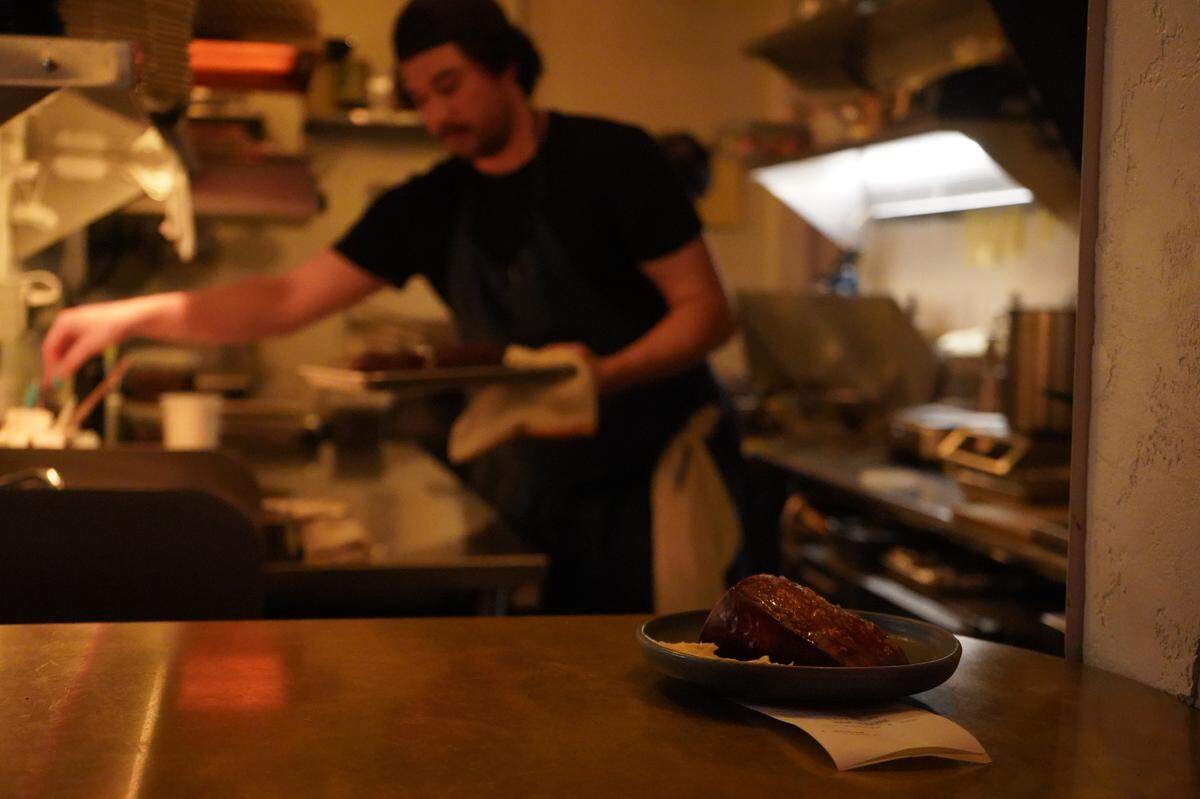 A dish is plated and ready to be served on Dec. 1, 2023, at Estelle restaurant in Bellingham, Wash.