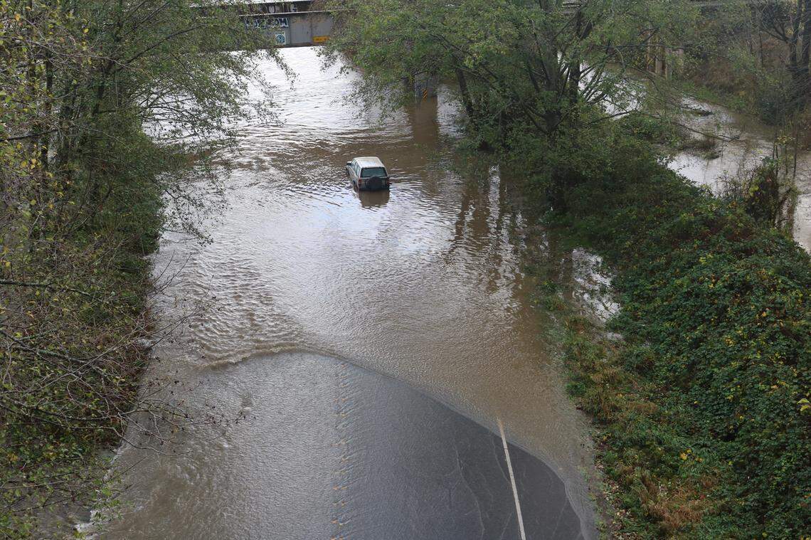 A car was stranded on Squalicum Way in Bellingham after the road was flooded on Monday, Nov. 15.