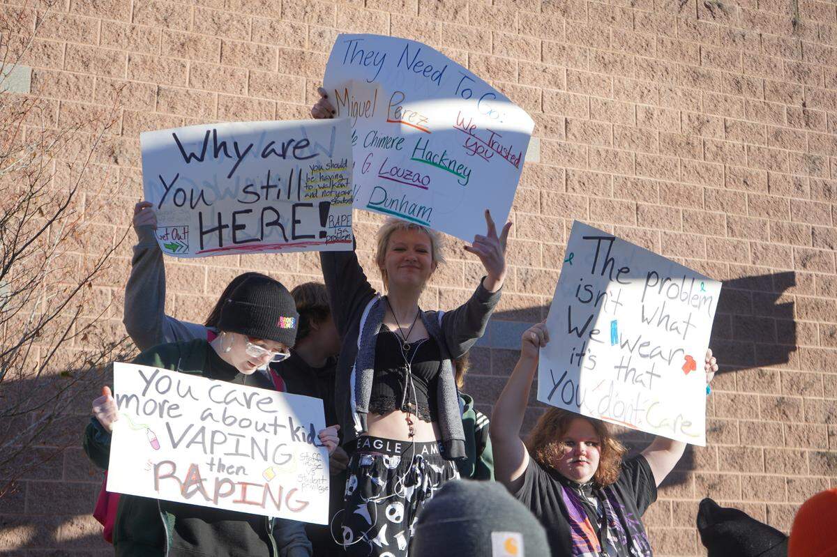 Hundreds of students, many holding signs, walked out of Squalicum High School Monday, Dec. 12, to protest after three Bellingham Public Schools assistant principals were issued criminal citations for failing to report a student’s sexual assaults.