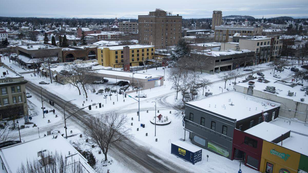 Bellingham, Wash., residents begin to navigate the snowy downtown streetsMonday, Feb. 11, 2019.