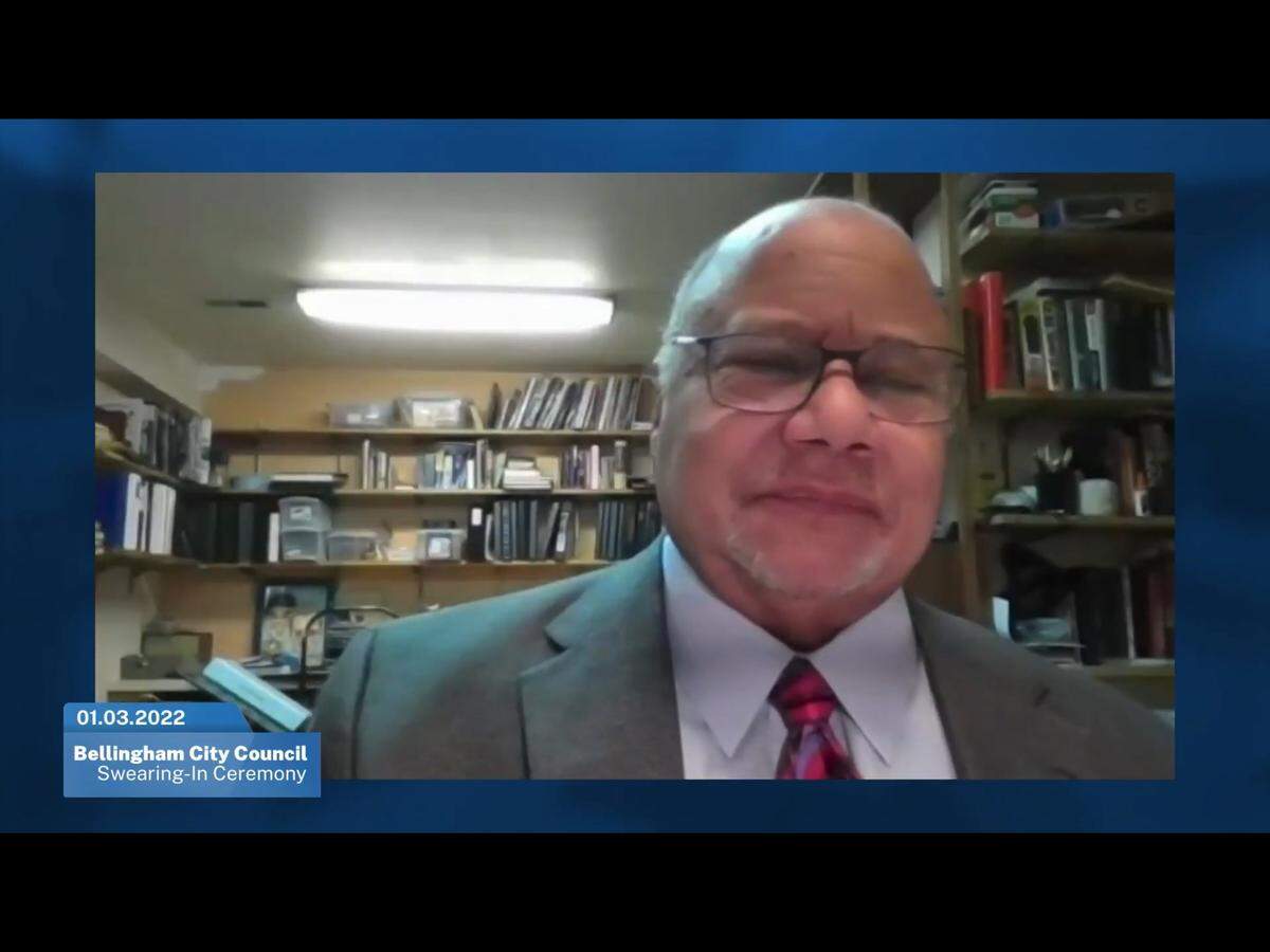 Edwin “Skip” Williams smiles as he finishes the oath of office for Bellingham City Council in this screenshot from an online ceremony Monday, Jan. 3, 2022, in Bellingham, Wash. Williams was one of the city’s first two Black council members elected in November 2021.
