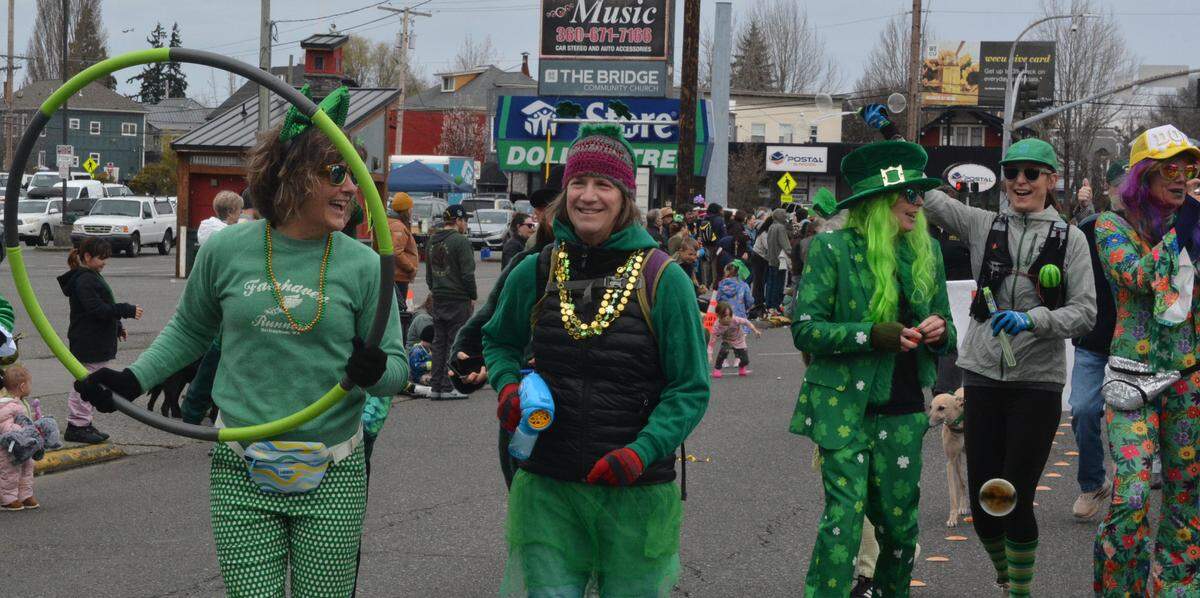 A group of civic-minded friends who call themselves the Department of Fun gather for community events such as the 16th annual St. Patrick’s Day Parade in Bellingham.