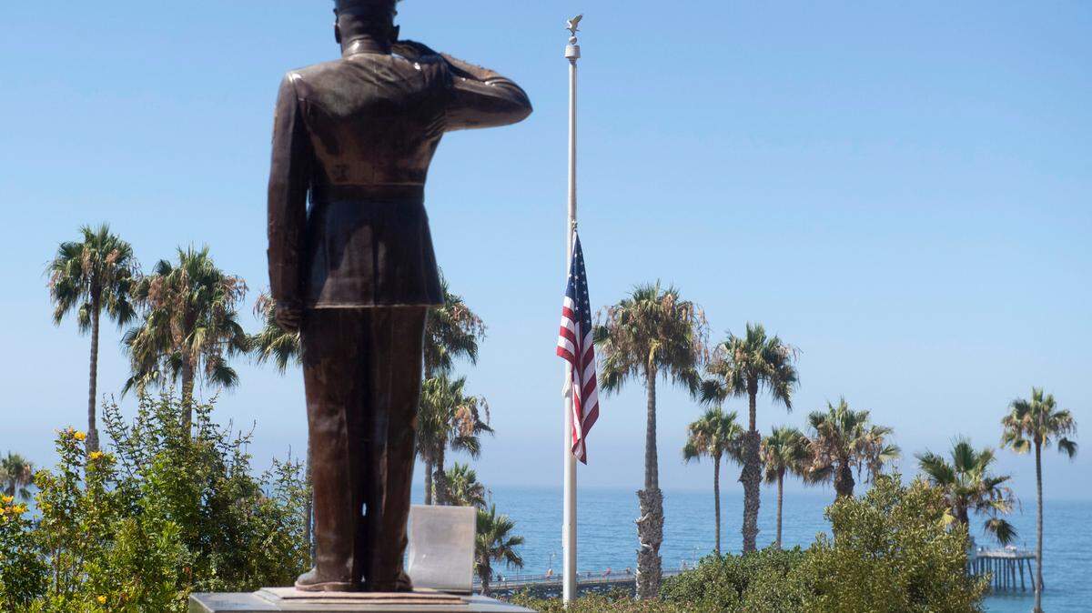 The U.S. flag was lowered to half-staff at Park Semper Fi in San Clemente, Calif., on Friday, July 31. The U.S. Marine Corps has identified all nine military service members killed when a Marine landing craft sank in hundreds of feet of water off the Southern California coast, and one of them has ties to Bellingham.
