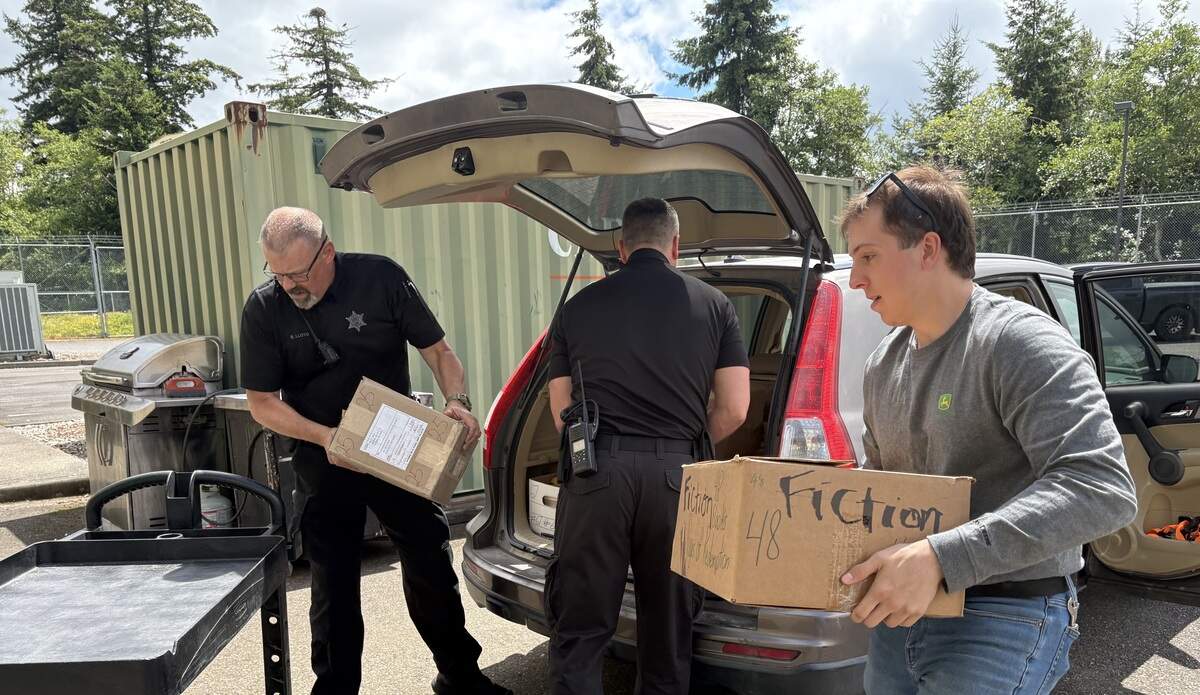 Bryson Fico, founder of Pages of Redemption, donated 762 books to the Whatcom County Jail on July 3, 2026.