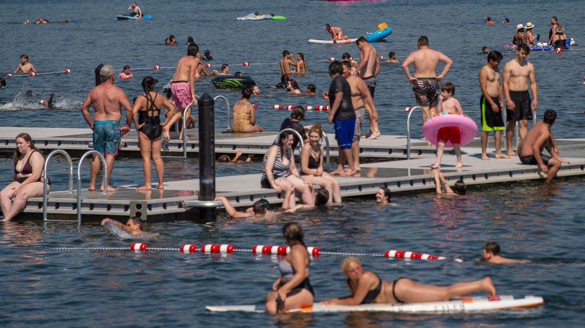 Hundreds pack the new floating H docks waters of Lake Whatcom to combat the record heat at Bloedel Donovan Park in 2021.