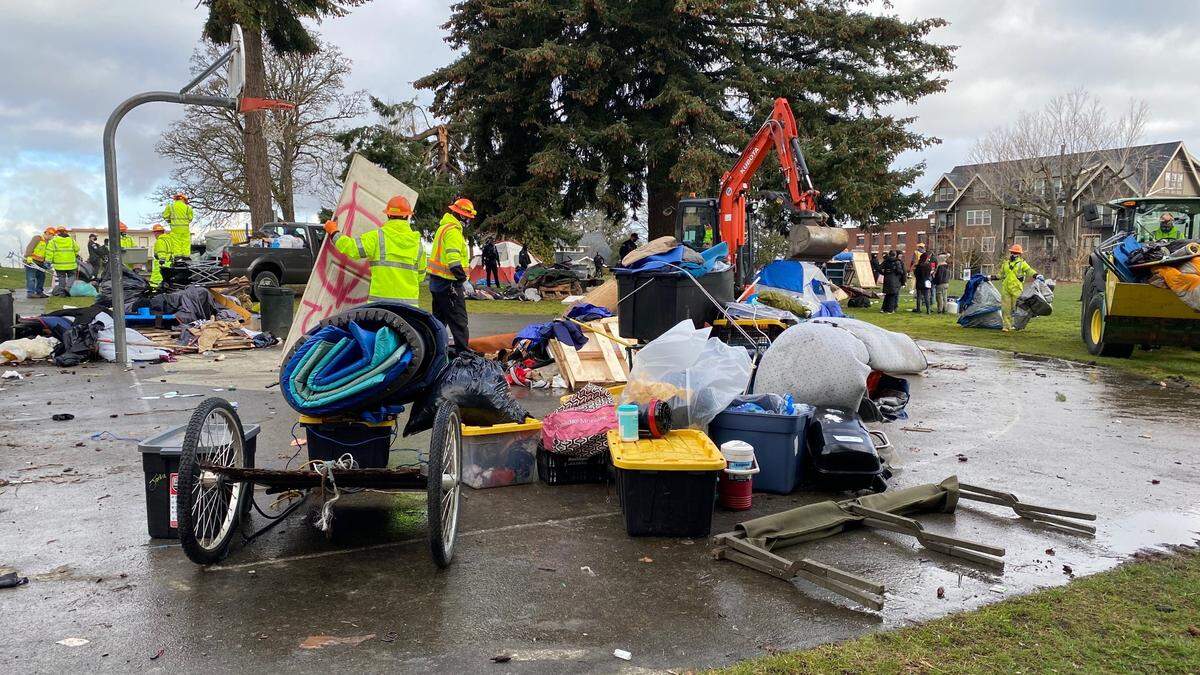 City workers direct homeless campers to pack up and leave Laurel Park in Bellingham about 8 a.m. Thursday, March 25.