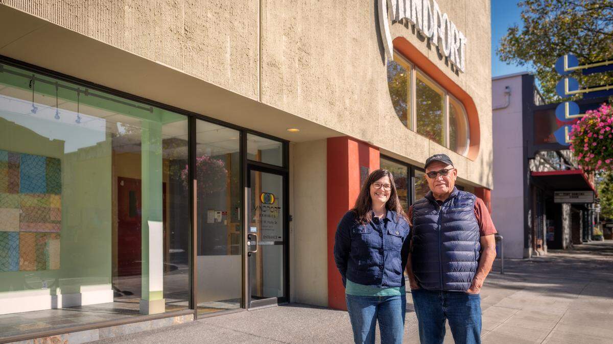 Tallie Jones of Mindport and Darrell Hillaire of Children of the Setting Sun Productions stand outside Mindport at 210 W. Holly St.