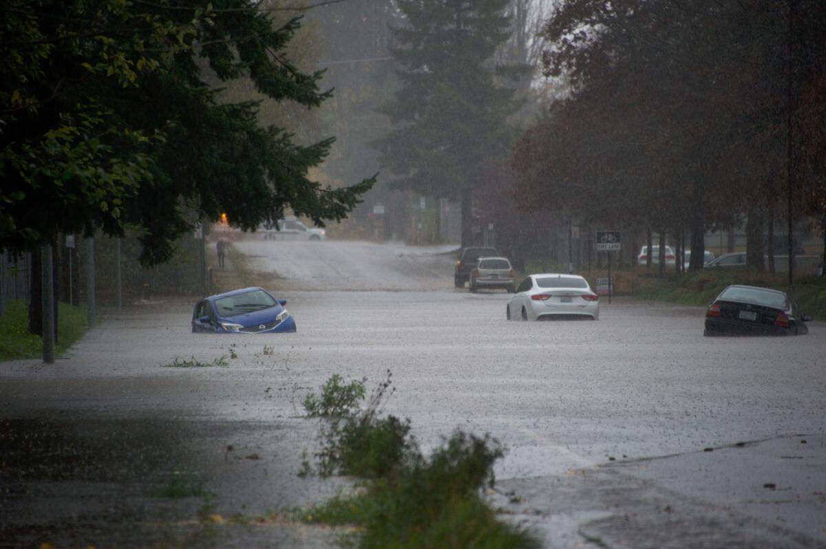 A record rainstorm Sunday-Monday, Nov. 14-15, flooded streets in Bellingham, including Fraser Street looking west from Puget Street.