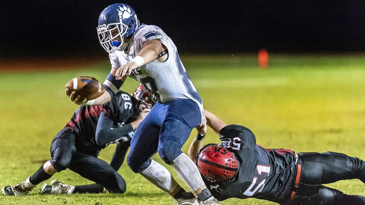 Lynden Christian wide receiver Zach Sipma is stopped by Mount Baker defender Davin Beason after a pass reception and short gain Oct. 18, 2019, on Bob Tisdale Field at Mount Baker High School in Deming. “The first time I touched a football, I knew I would love the game,“ Beason said.