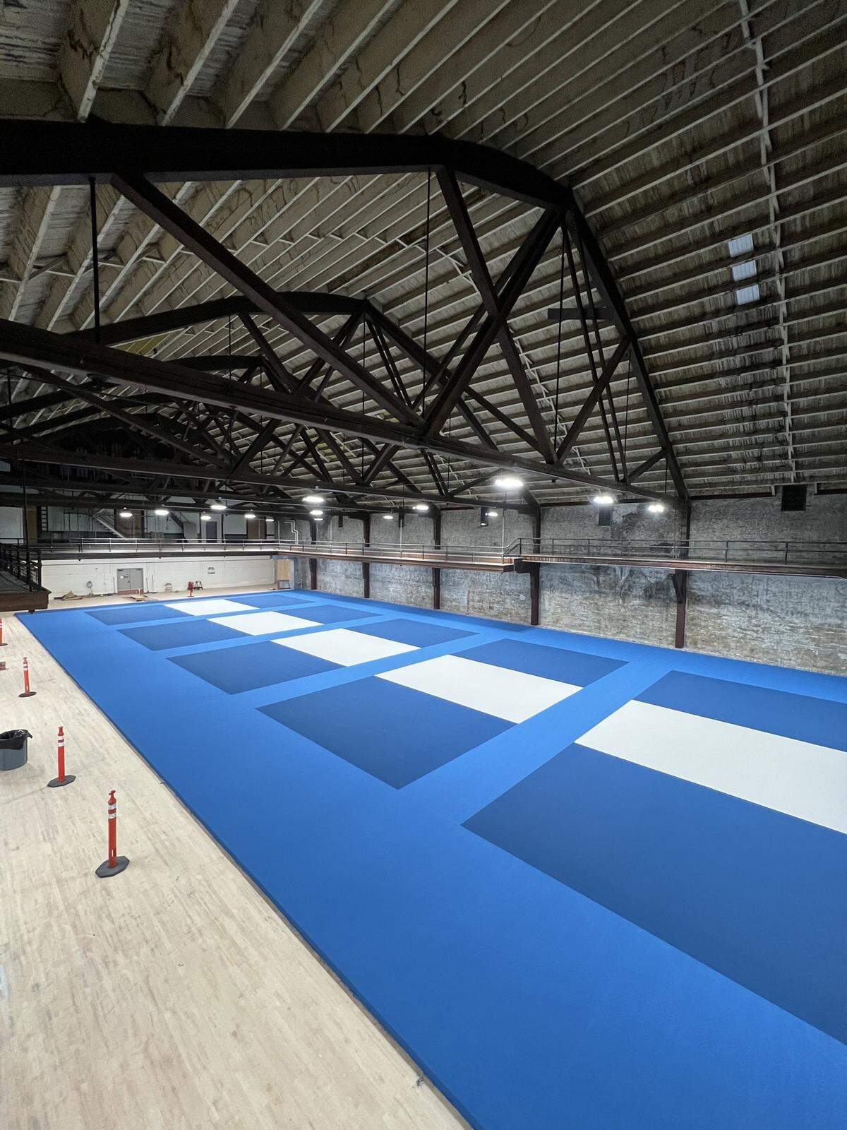 Five pickleball courts are almost complete for a new members-only pickleball club inside the Armory building in Bellingham.