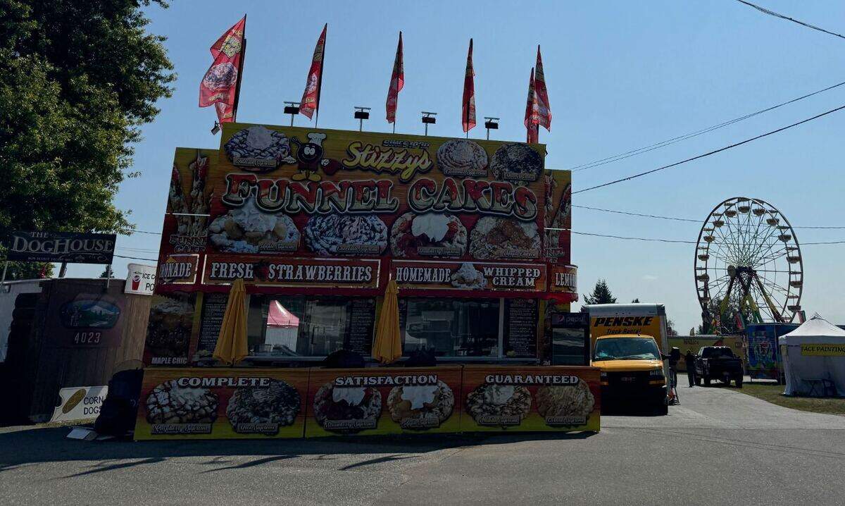 A carnival ride and funnel cake stand at The Northwest Washington Fairgrounds at 1775 Front St. in Lynden, Wash. on August 7, 2024.