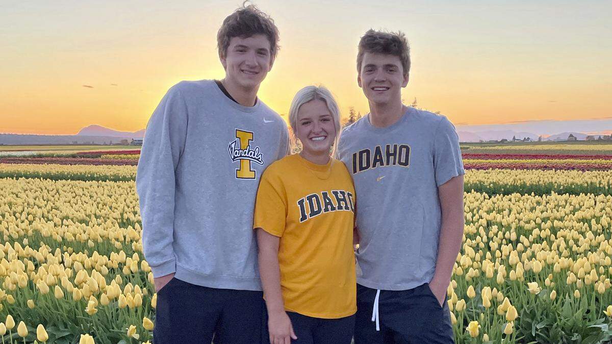 Triplets Ethan, Maizie and Hunter Chapin visit a tulip field in La Conner in 2021. Ethan Chapin was one of four University of Idaho students found stabbed to death in a home near the Moscow, Idaho, campus in 2022. Tulip Valley Farms created a special tulip bulb mix called Ethan’s Smile to honor the memory of their co-worker.