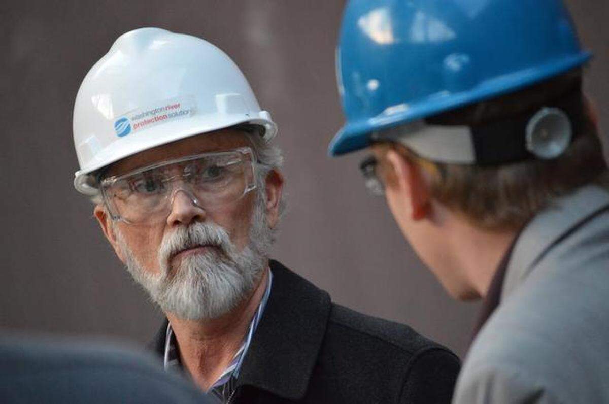 Rep. Dan Newhouse, R-Wash., is briefed during a tour of the Hanford nuclear reservation.
