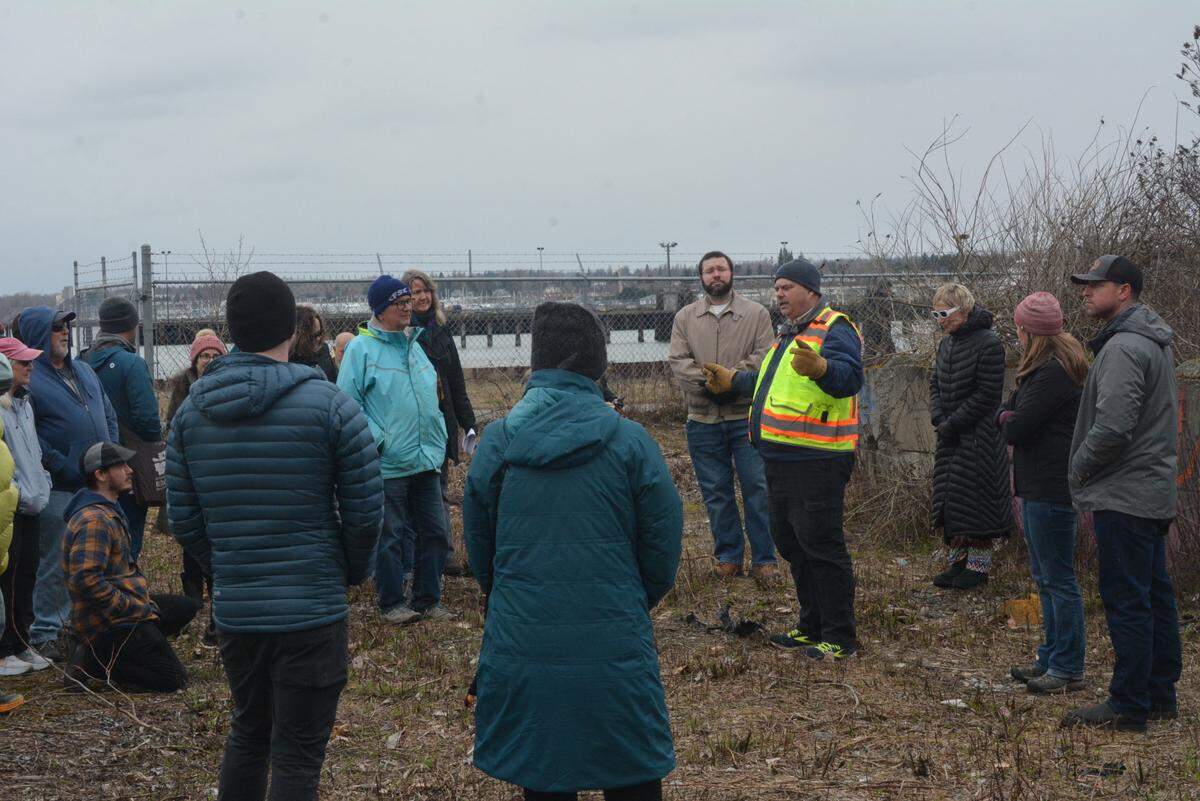 Craig Mueller, a Bellingham Department of Public Works engineer, talks to a group of people who are touring the former RG Haley site on Tuesday in Bellingham.