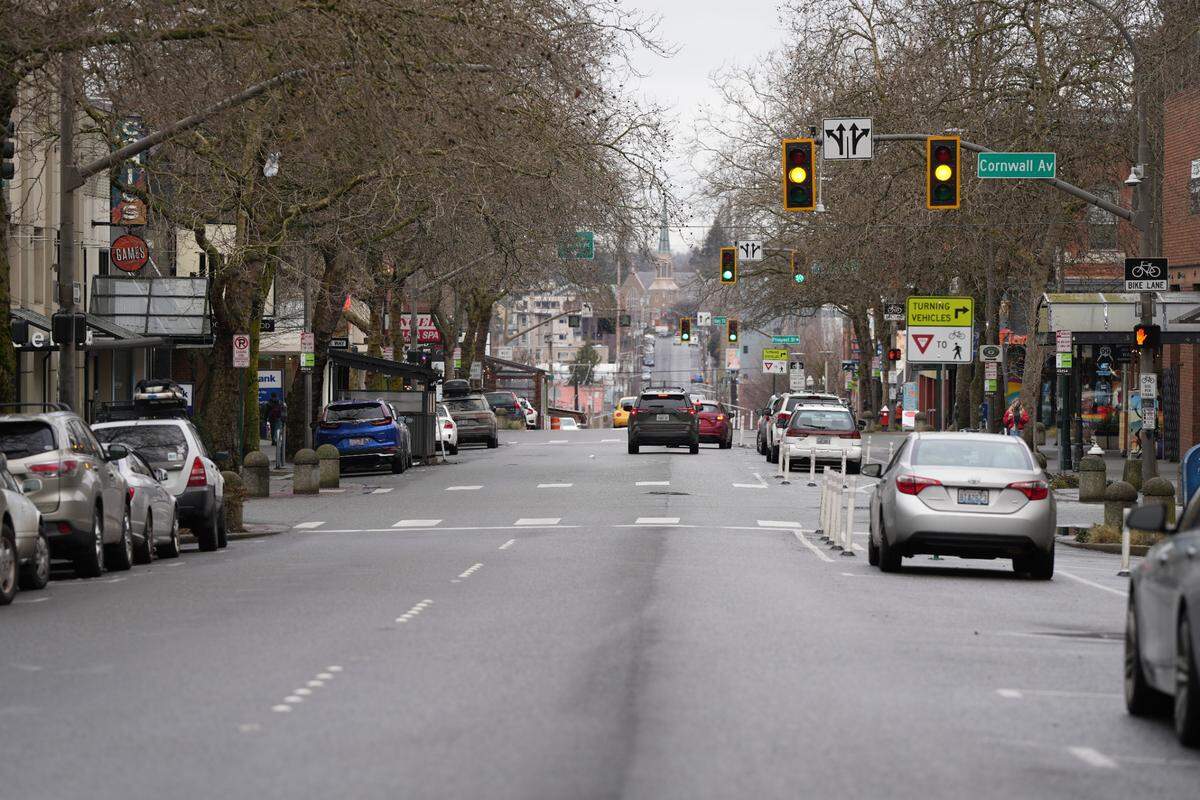 Cars drive down Holly Street in downtown Bellingham in February.