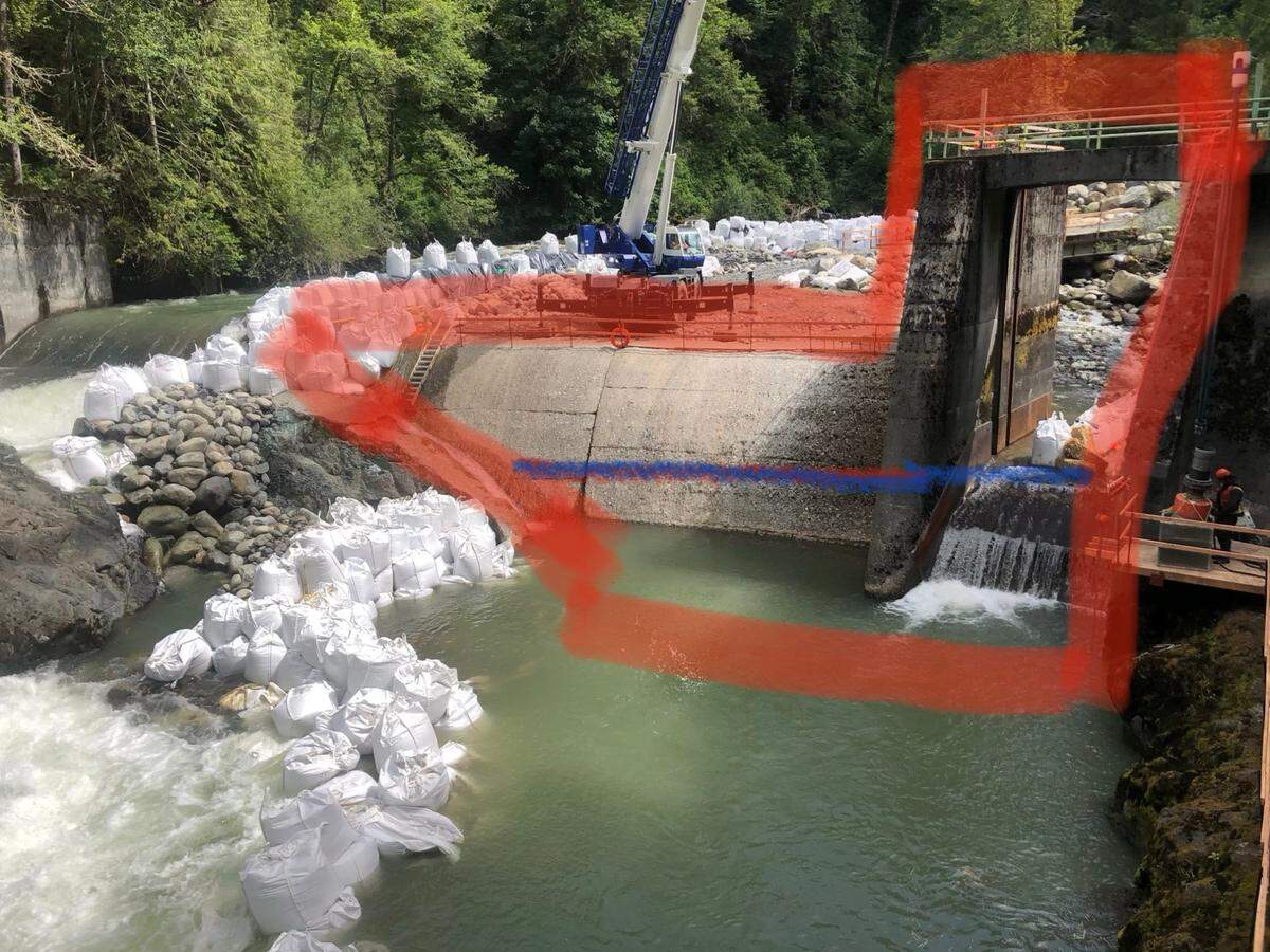 Work continues to remove the city of Bellingham’s diversion dam from the Middle Fork of the Nooksack River in Whatcom County. Everything in the red box is set to be blown up and taken away. The first blast set on Monday, July 13, will take out everything above the blue line. The second blast, set for Saturday, July 18, will remove the rest.
