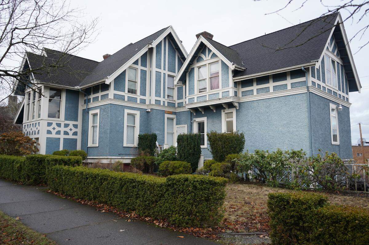 The historic J.J. Donovan house sits on the corner of North Garden and East Chestnut streets in Bellingham. An apartment complex will be built next to the house that now offers co-op-style apartments.