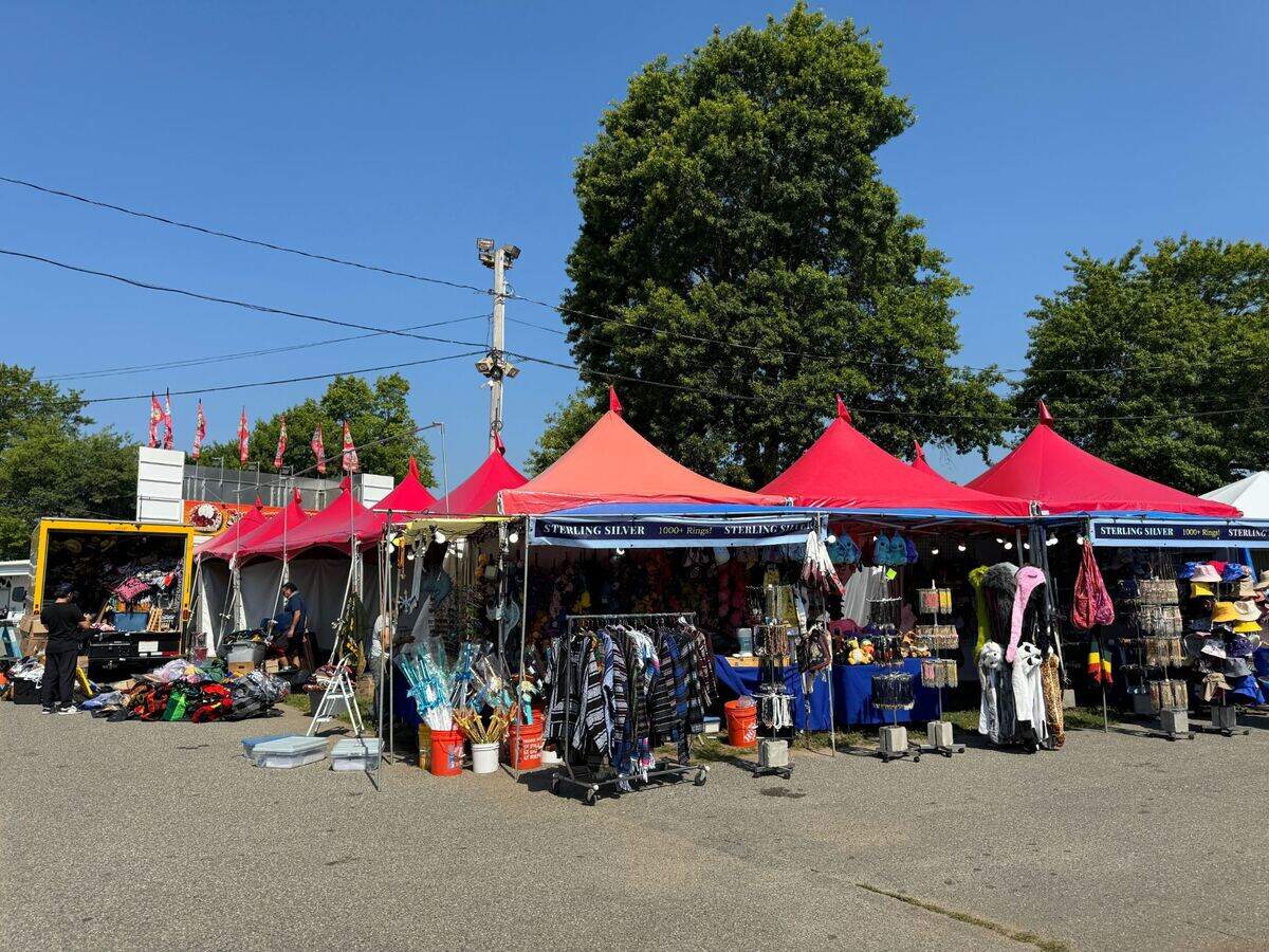 Vendors setting up their booths at The Northwest Washington Fairgrounds at 1775 Front St. in Lynden, Wash. on August 7, 2024.
