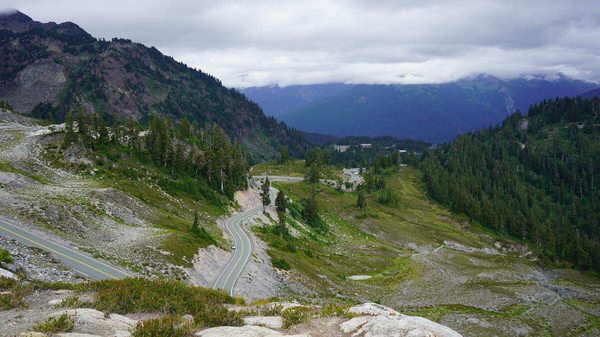 Cars drive on Mount Baker Highway leading up to Artist Point in Whatcom County, Wash.
