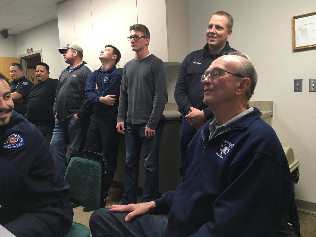 Volunteer firefighter Ron Swanson, right, announces his retirement at a December 2018 training session at Station 21.