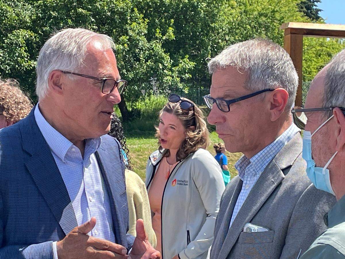 Washington State Gov. Jay Inslee, left, and Bellingham Mayor Seth Fleetwood talk after a grand opening event for Kulshan Land Trust townhomes on Wednesday, July 13, in Bellingham. Affordable housing remains a challenging issue in Whatcom County, given the need for different mixes of housing.