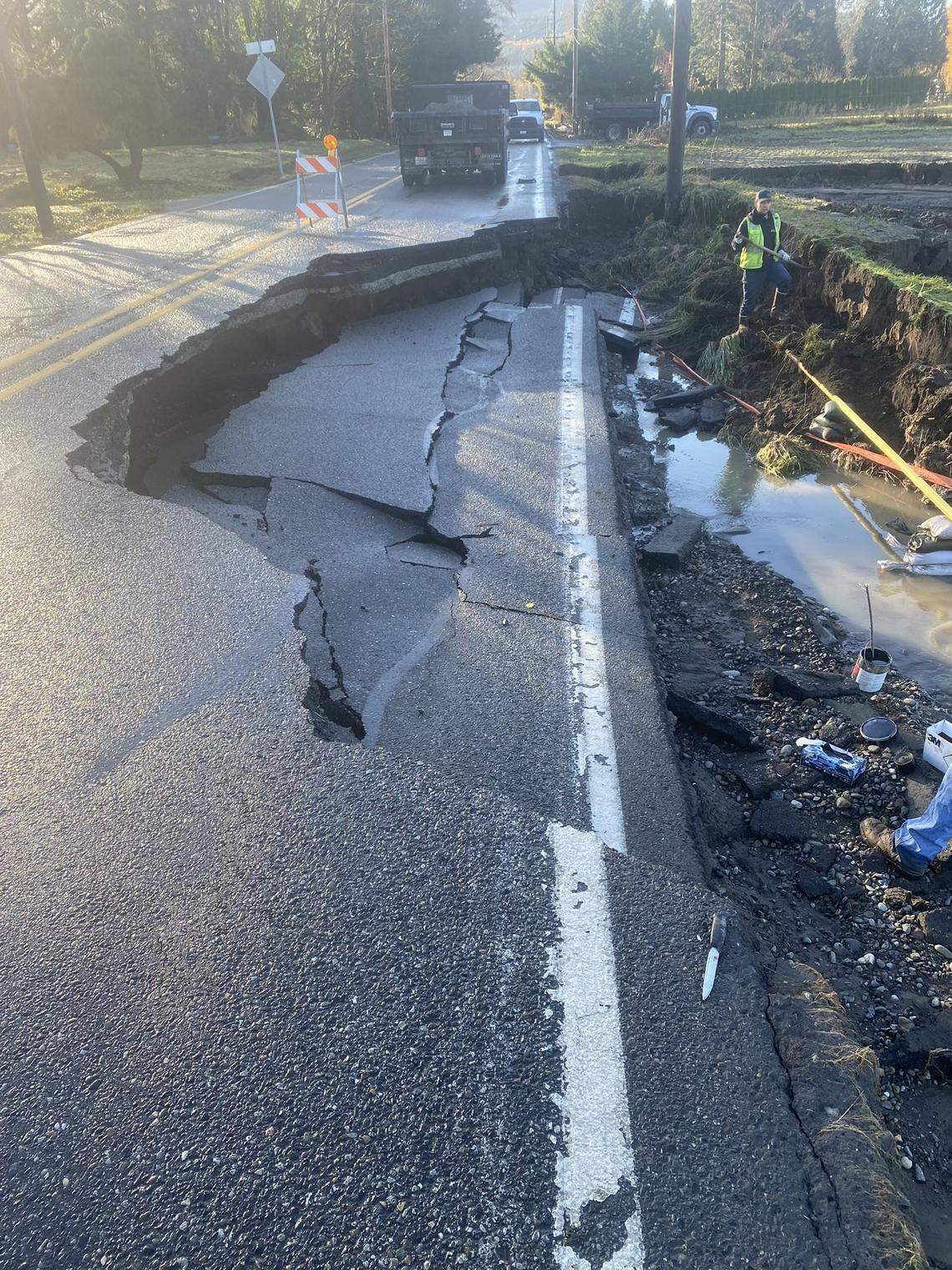 A section of Lawrence Road (State Route 9) in Whatcom County between Siper Road and the Mount Baker Highway has washed away, exposing a natural gas line. The Washington State Patrol on Tuesday, Nov. 16, is advising avoiding the area.