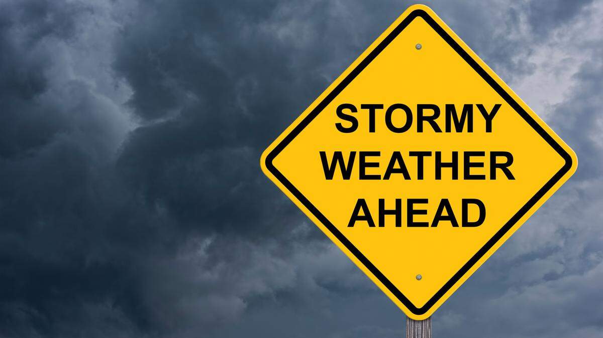 Stormy Weather Ahead Caution Sign stock image.