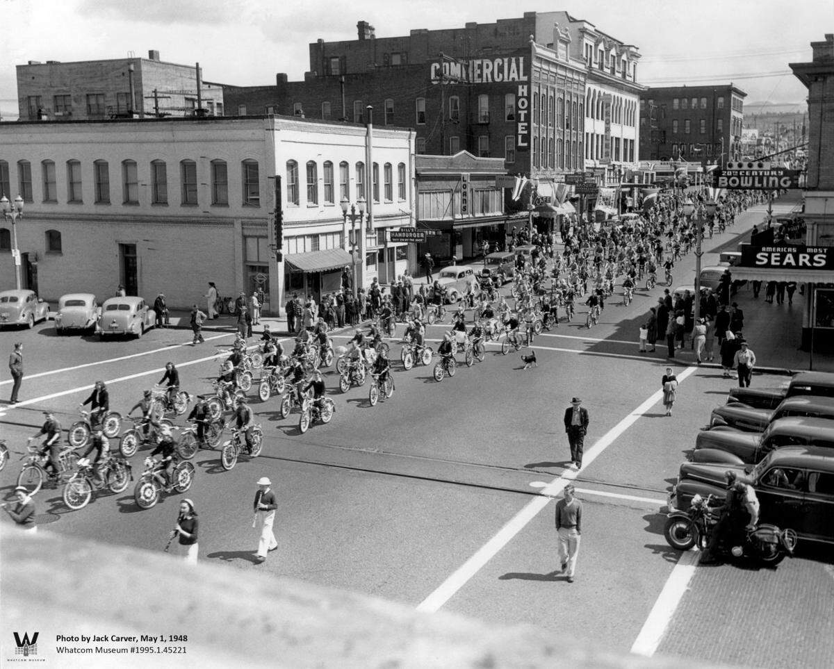 About 800 Whatcom County youth ride decorated bicycles in a May 1, 1948, bike parade down Holly Street in Bellingham. The city plans to recreate the photo on Sunday, May 1, with a 1 p.m. ride from WECU on East Holly to Waypoint Park.