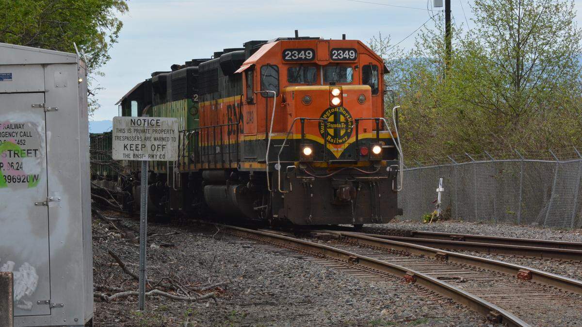 A BNSF freight train heads toward downtown Bellingham along the waterfront at Wharf Street in this file photo.