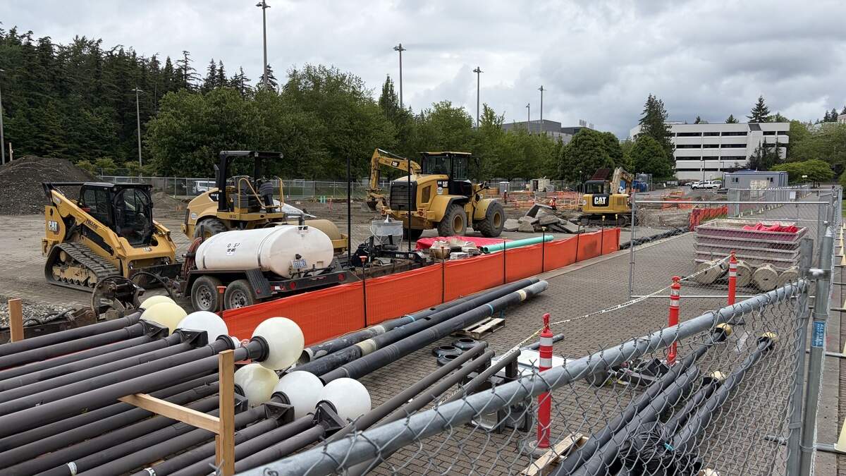 Crews work at the site of Western Washington University’s future Western Welcome Center building on June 5.