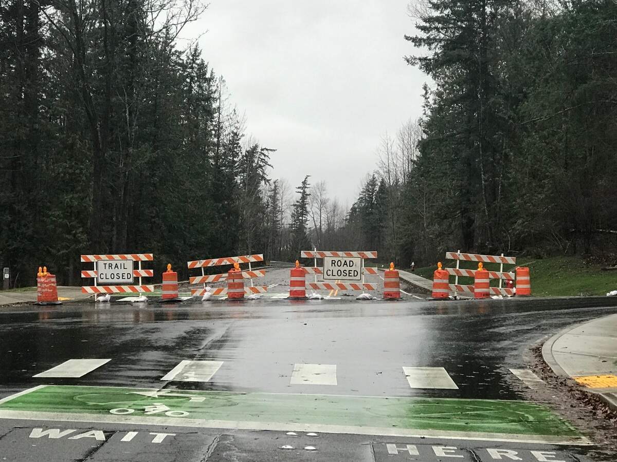 Barriers remain up Saturday, Dec. 18, at the intersection of Birchwood Avenue and James Street in Bellingham. The City of Bellingham expects to open the new road that will extend Birchwood Avenue east to the intersection of Orchard Drive and James Street, from the sharp corner at Squalicum Parkway north of St. Joseph Hospital, late this month. Once complete, the city expects 6,000 vehicles per day to use to the new road.