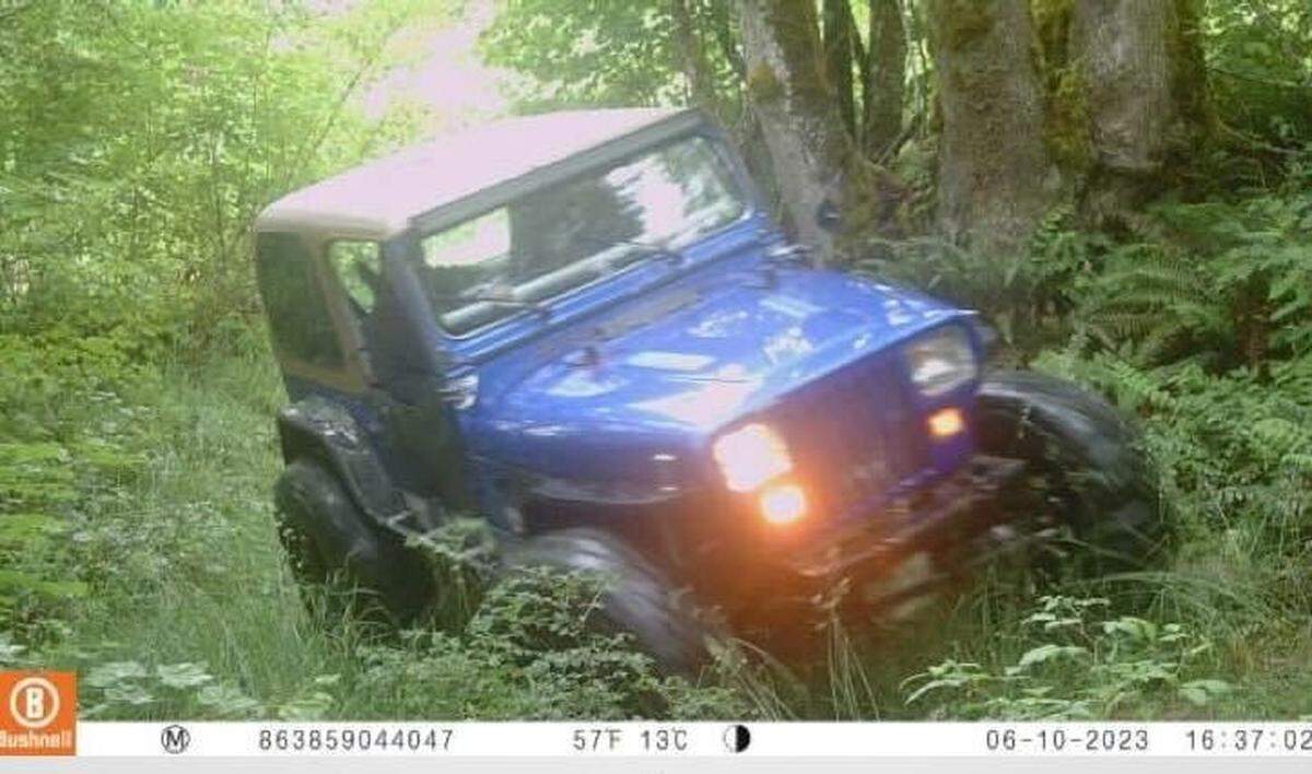 A trail camera recently photographed a Jeep going across protected land in the Lake Whatcom watershed. Such activity is illegal.