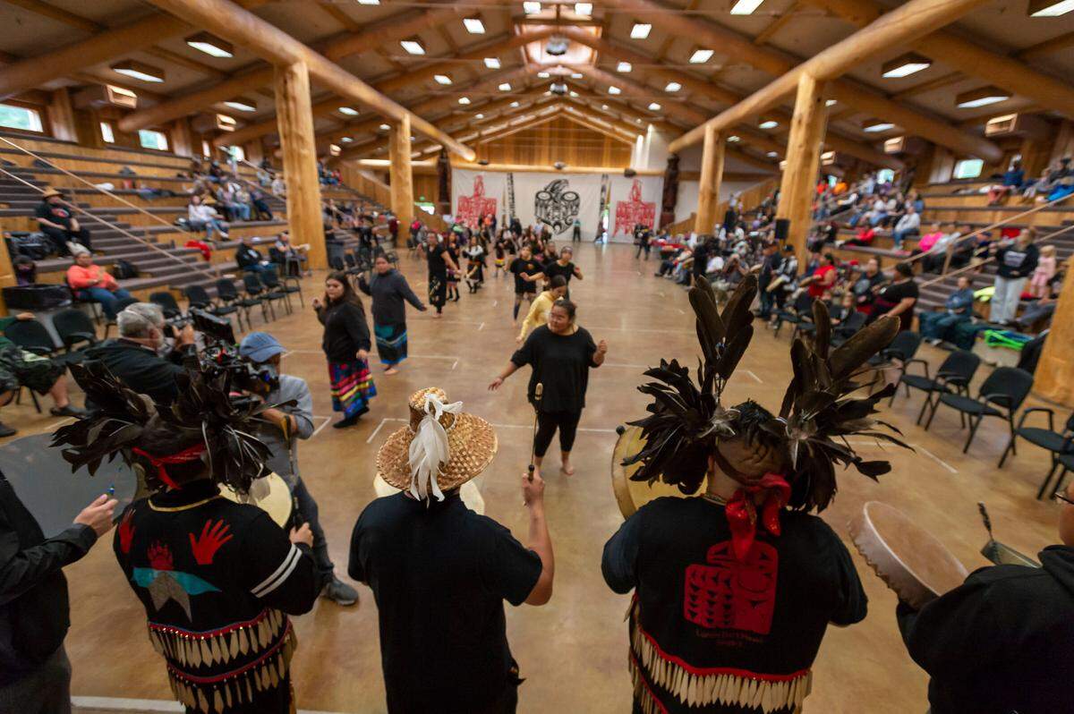 The Lummi Nation Blackhawk Singers perform during the Gathering of the Eagles canoe landing celebration at the Lummi Nation Community Center on Friday afternoon May 27, on the Lummi Reservation in Whatcom County.