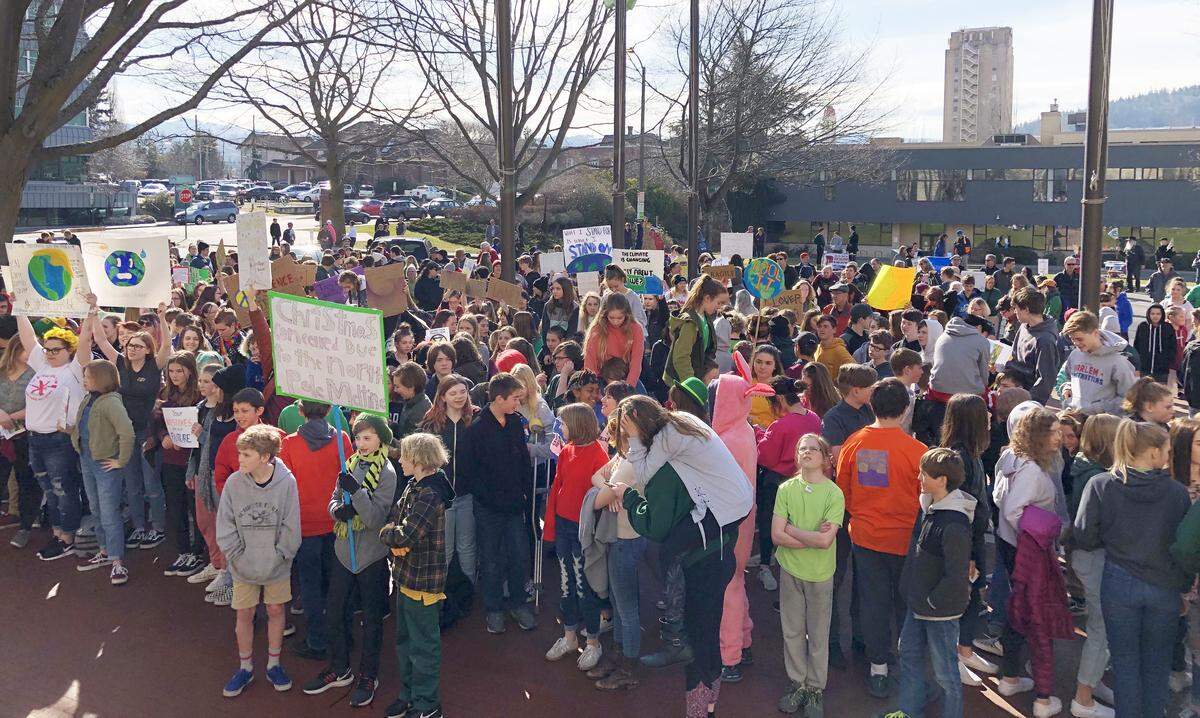 Several hundred Bellingham high school students rally Friday at City Hall to protest government inaction on climate change. The event was part of a nationwide effort, Youth Climate Strike.