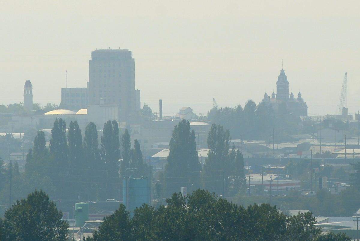 Smoke from British Columbia wildfires covers downtown Bellingham in August 2017. ising regional temperatures; changes in rain and snow, longer dry periods and reduced soil moisture have increased the likelihood of major wildfires west of the Cascades.
