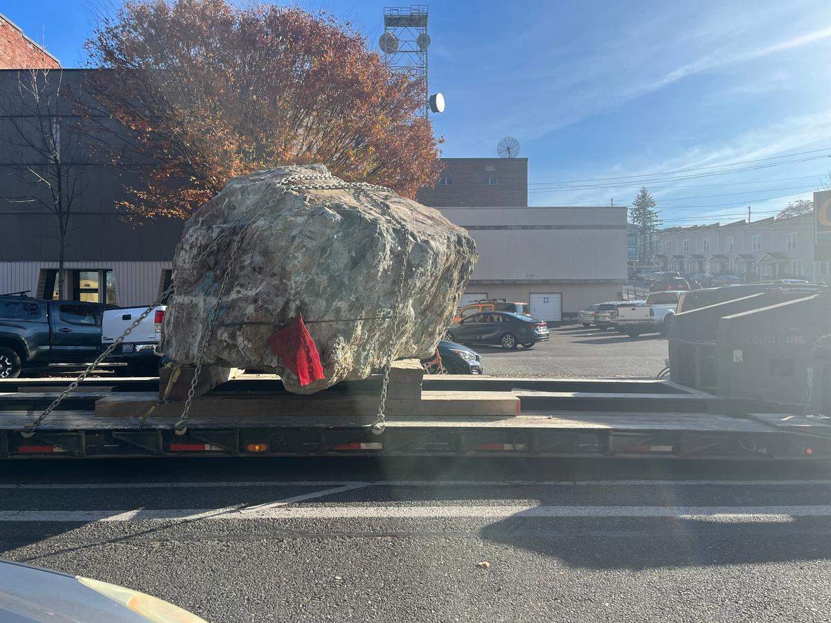 A multi-ton boulder trucked along State Street to the Bellingham Shipping Terminal Wednesday, Nov. 15, in Bellingham.