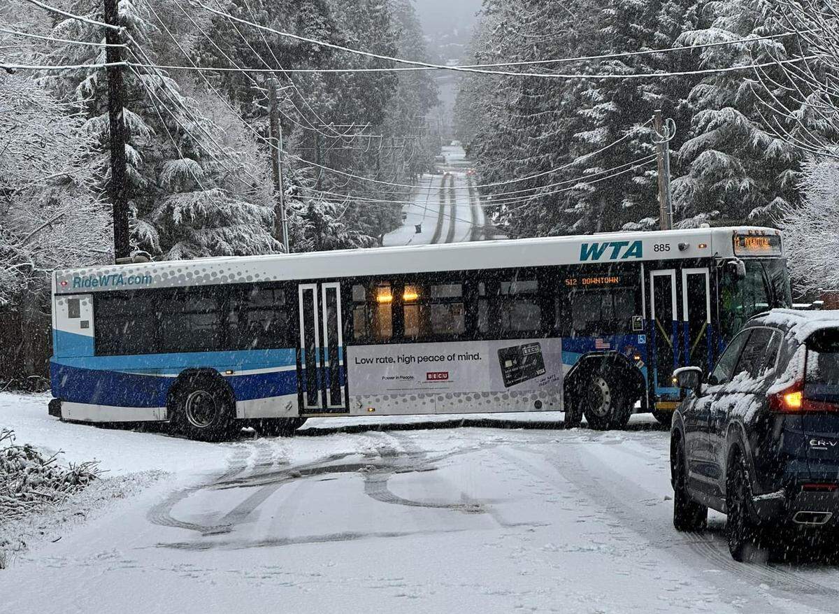 A Whatcom Transportation Authority bus on the Sudden Valley-downtown route apparently lost traction in light snow at the top of the Austin Street hill near Lake Louise Road on the edge of the Geneva neighborhood on Saturday.