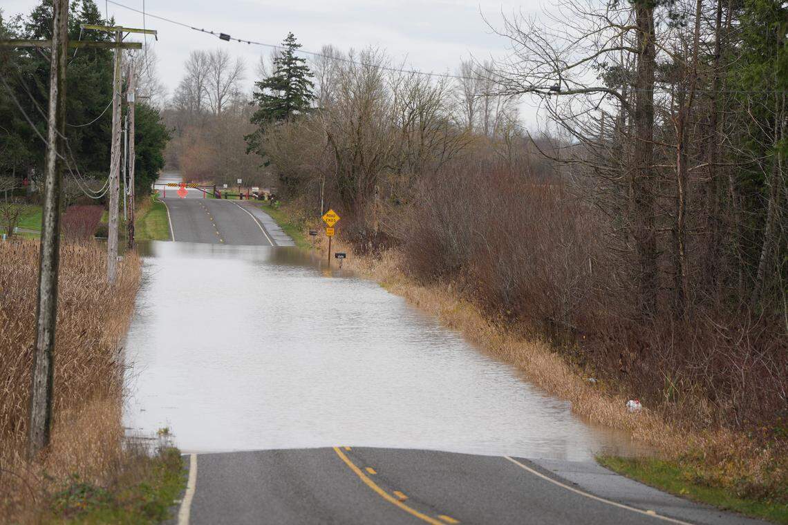 Neilsen Road was impassible by vehicle on December 11, 2025, after the Nooksack River flooded the roadway in Ferndale, Wash.