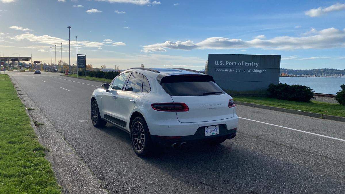 A Canadian car approaches the U.S. Port of Entry in Blaine, Wash., on Monday, Nov. 9, as the border opens to all for the first time in 597 days after the two countries each restricted travel to “essential” crossings only in an effort to slow the spread of the COVID-19 pandemic in March of 2020.