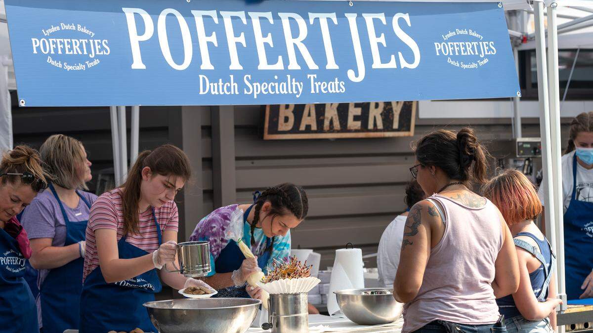 Lynden Dutch Bakery employees prepare poffertjes, a traditional Dutch pancake and fair favorite, at the Northwest Washington Fair on Thursday, Aug. 12, in Lynden.
