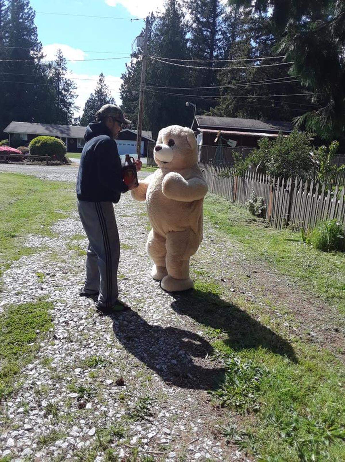 Boozey Bear makes a delivery to a friend. Boozey is winning the hearts of Whatcom County residents by delivering alcohol gifts and cheer to friends during the coronavirus pandemic.
