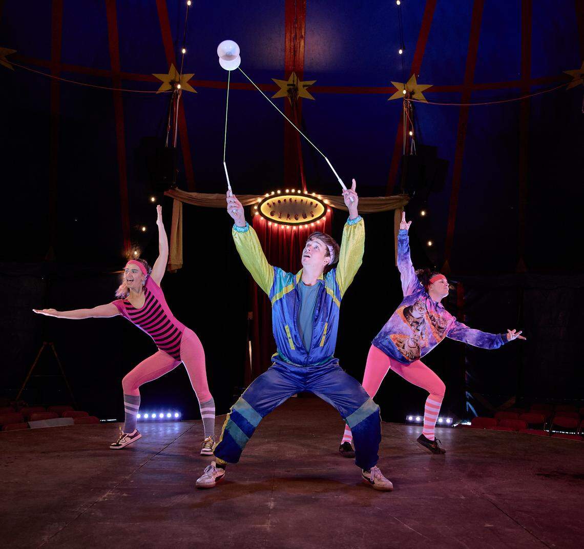 Willem Mcgowan, Taryn Mindt, and Heidi Blossom perform as part of Shoestring Circus.