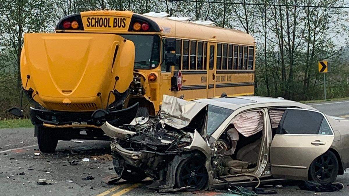 A driver was seriously injured in a crash with a school bus on West Pole Road between Guide Meridian and Aldrich Road south of Lynden, Wash., on Tuesday, May 2, 2023. The bus driver and two students sustained minor injuries.