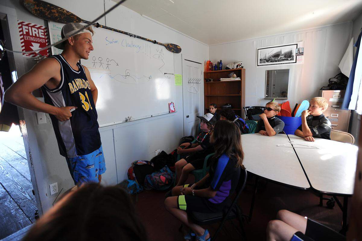 Kids learn how to sail on Bellingham Bay on the first day of the Community Boating Center Adventure Sailing Camp in 2014.