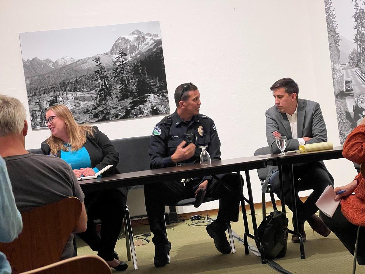 Washington state Rep. Alicia Rule, D-Blaine, left, is shown with Deputy Chief Don Almer of the Bellingham Police Department, center, and state Rep. Alex Ramel, D-Bellingham, before the start of the “Lens on Law Enforcement and the Legislature” town hall meeting Tuesday, Sept. 20, in the Rotunda Room of the Whatcom Museum’s Old City Hall gallery in Bellingham.