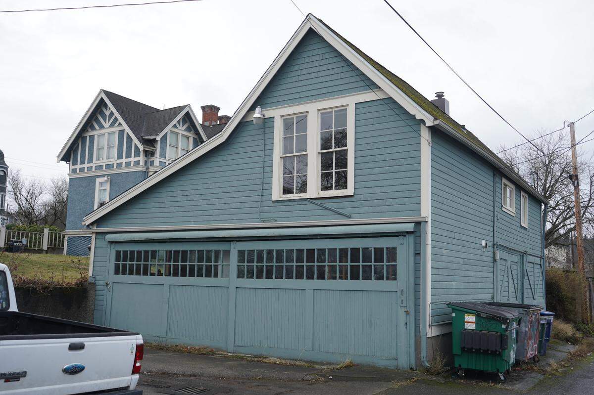 The J.J. Donovan rear carriage house sits behind the main house on an alley way on Thursday, Dec. 8, in Bellingham. It is expected to be demolished to make room for a multi-family apartment complex in the spring of 2023.