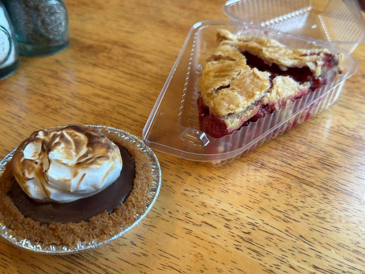 A s’mores mini pie and slice of cherry pie from Snohomish Pie Company at 915 1st St., Snohomish, Wash. on August 23, 2024.
